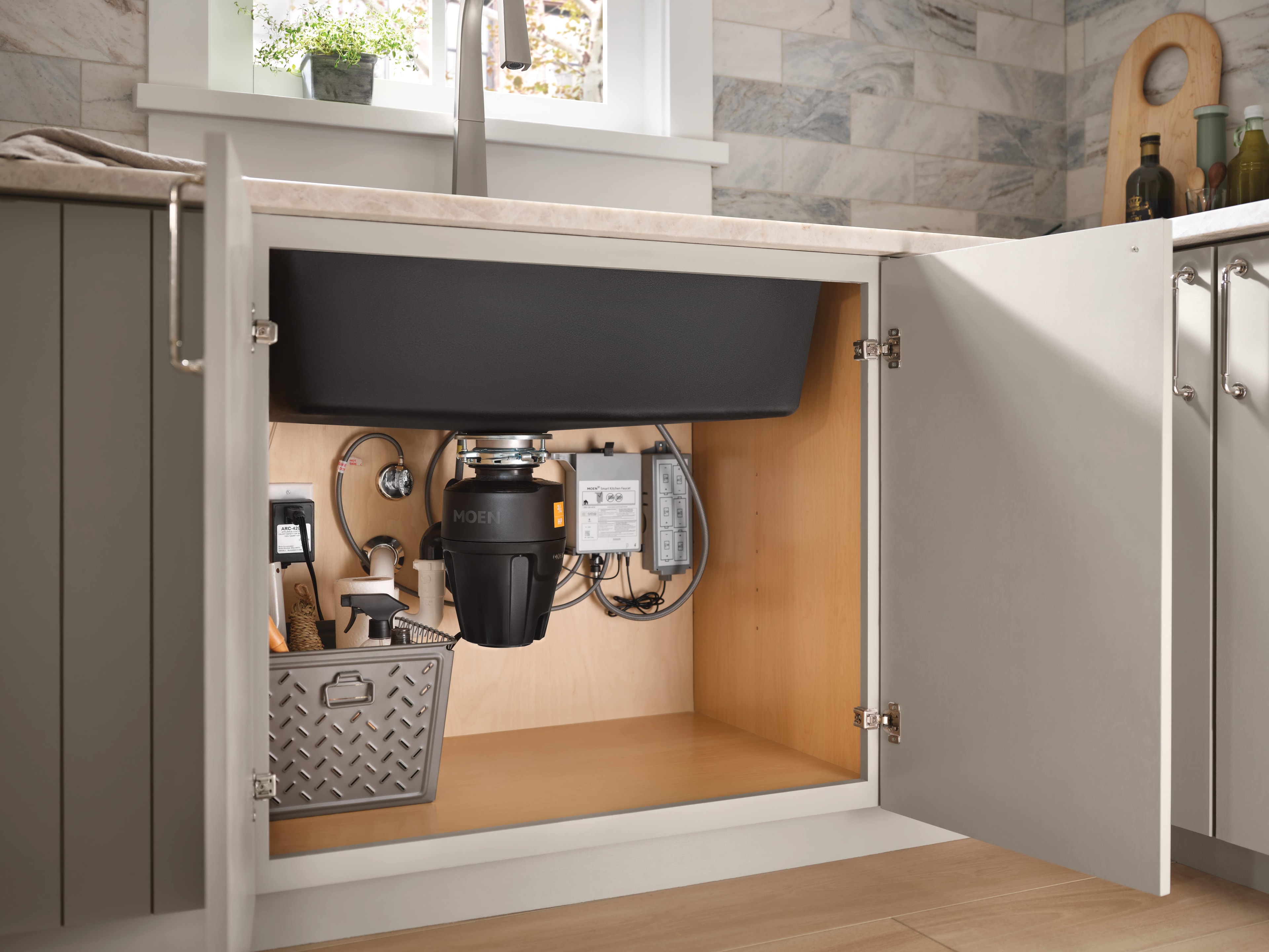 Smart faucet system under the sink.